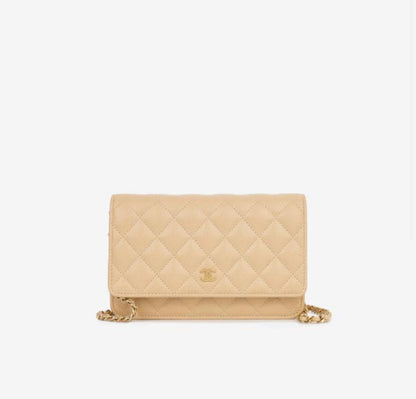Wallet on Chain (WOC) in beige caviar leather with gold-tone hardware
